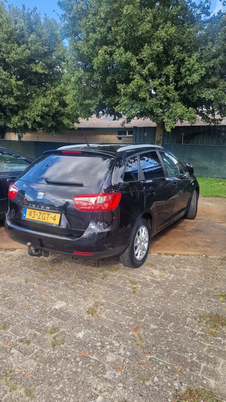 Seat Ibiza 1.4 63KW ST / cruise control /airco 2011 Zwart, Auto's, Voorwielaandrijving, 40 €/maand, 4 cilinders, Stationwagon