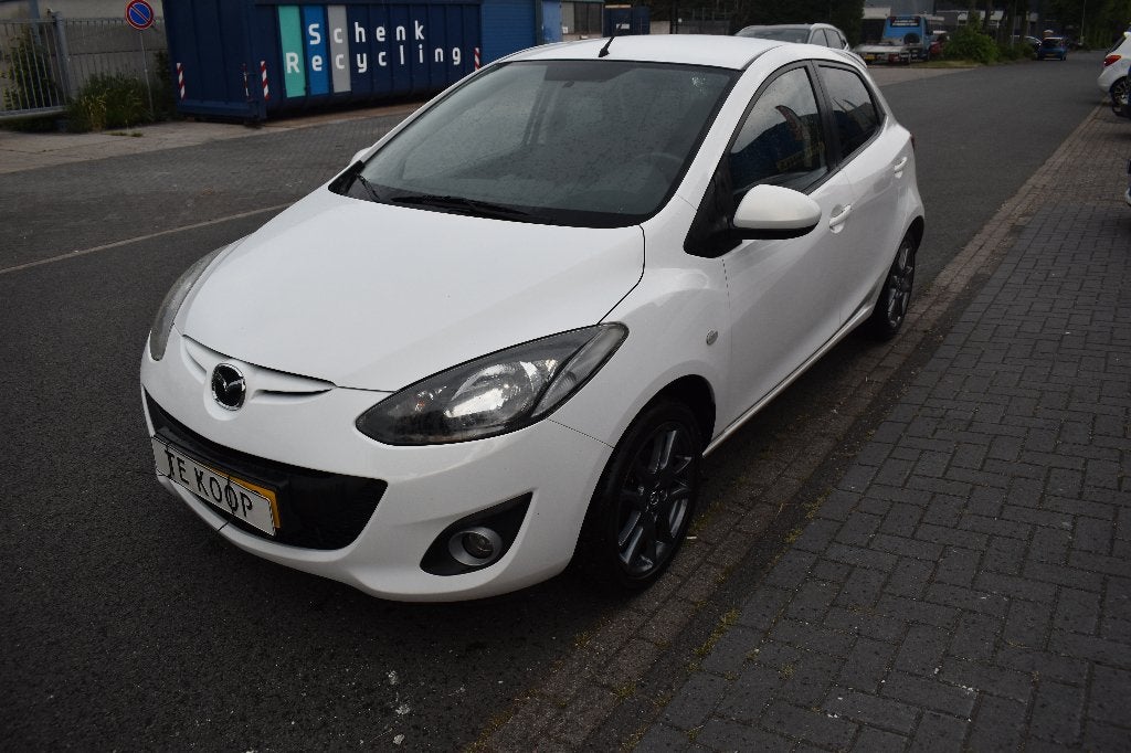 Mazda 2 1.3 Bifuel 62KW 5DRS 2012 Wit NIEUWE APK, Auto's, Mazda, Voorwielaandrijving, 15 km/l, 37 €/maand, Bluetooth