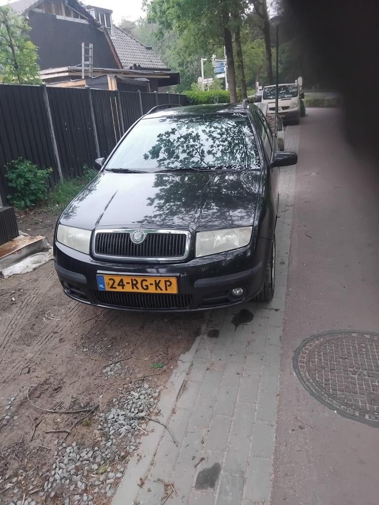 Skoda Fabia 1.4 Combi 55KW 2005 Zwart, Auto's, Voorwielaandrijving, 74 pk, 4 cilinders, 1070 kg