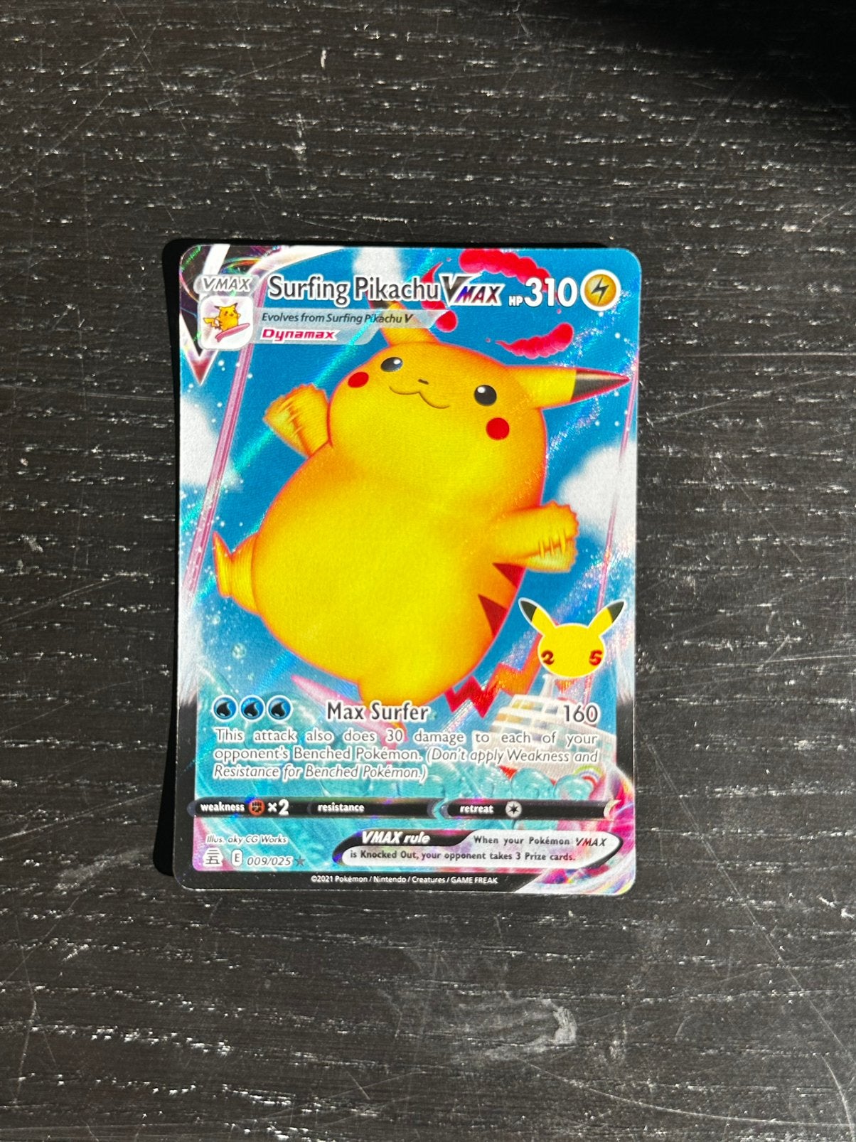Surfing Pikachu VMAX Ultra Rare Celebrations 009/025, Ophalen of Verzenden, Zo goed als nieuw