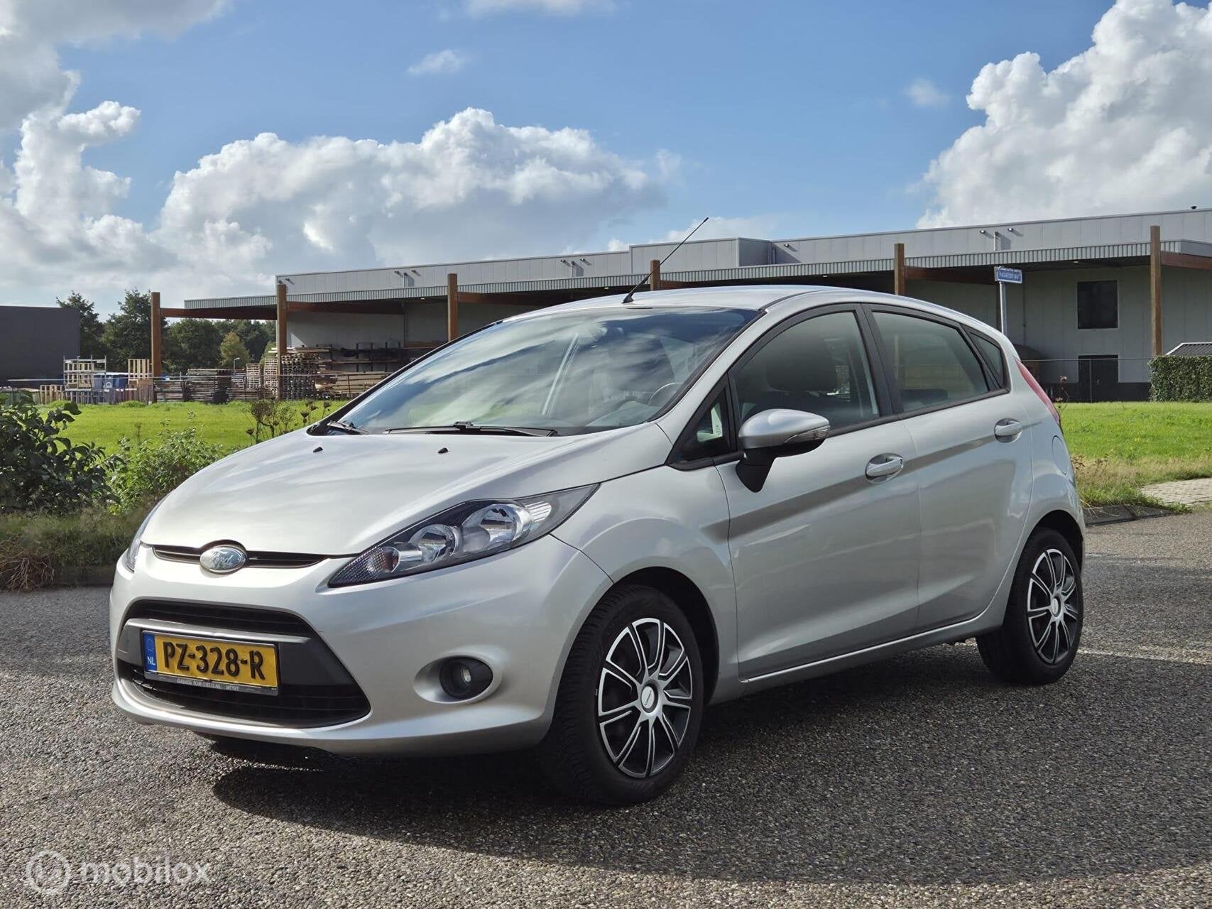 Ford Fiesta 1.25 Ghia Airco / 5 deur / NAP / Nieuwe apk, Voorwielaandrijving, 1242 cc, Electronic Stability Program (ESP), 82 pk