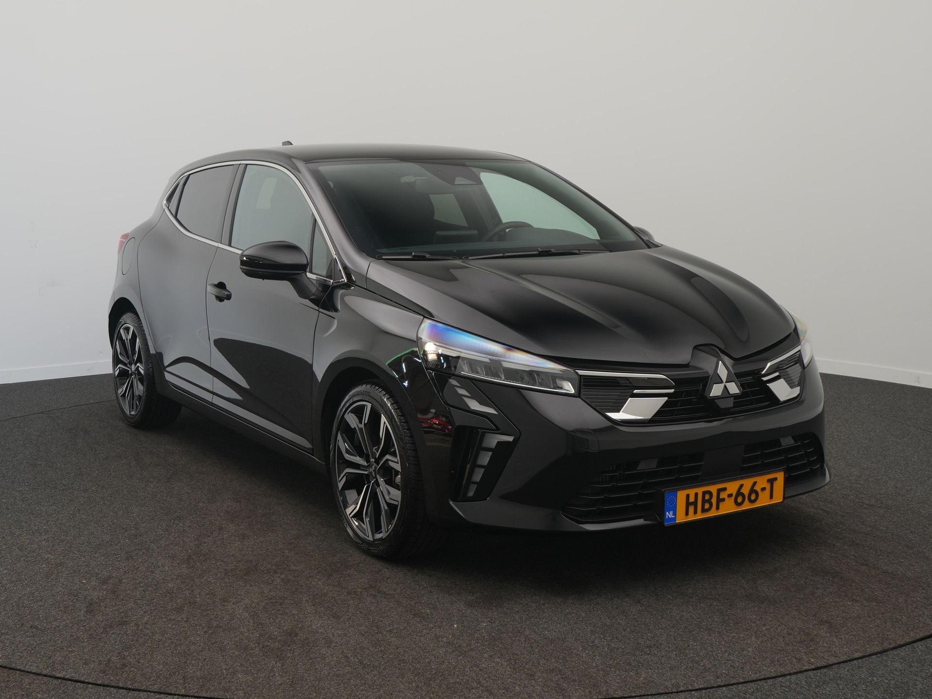 Mitsubishi Colt 1.0T 90 Turbo First Edition - RIJKLAARPRIJS, Auto's, Voorwielaandrijving, 12 maanden, Gebruikt, Leder en Stof