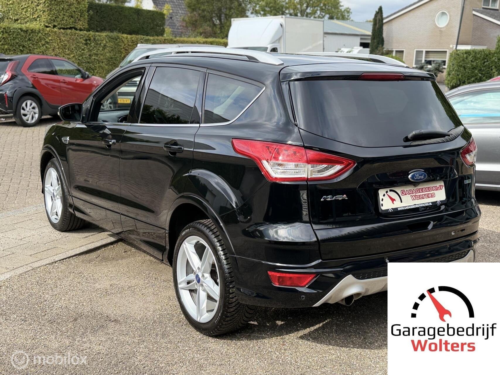 Ford Kuga 1.5 EcoBoost Titanium 150pk half leder vol opties, Auto's, Zwart, 4 cilinders, Leder en Stof, Zwart