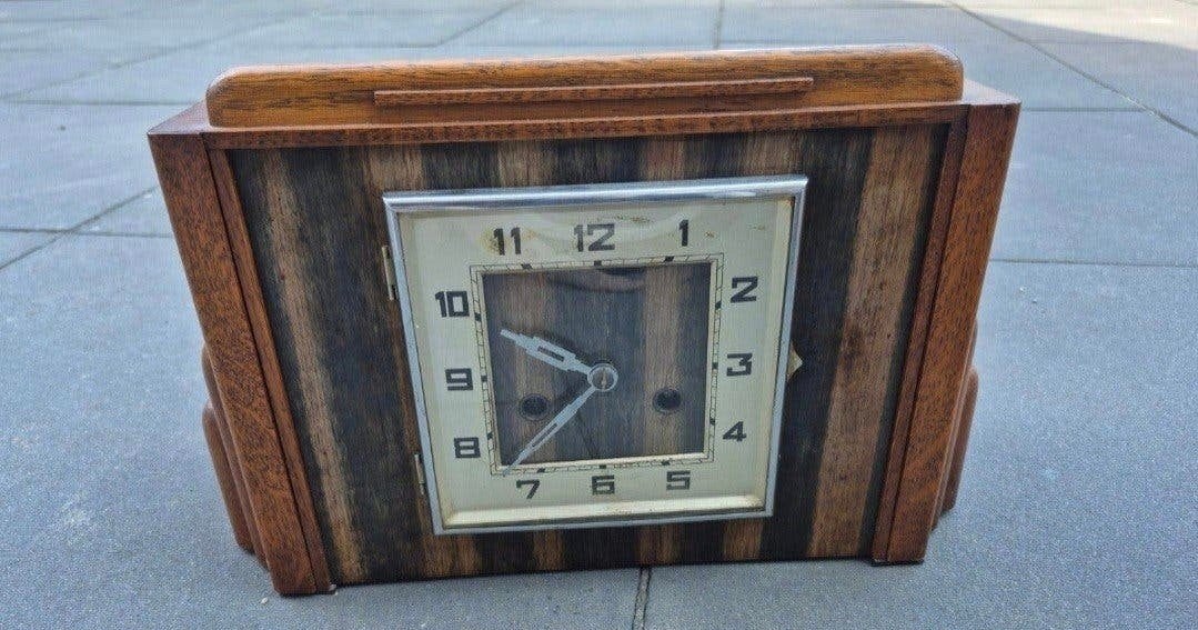 Antieke houten tafelklok, Ophalen