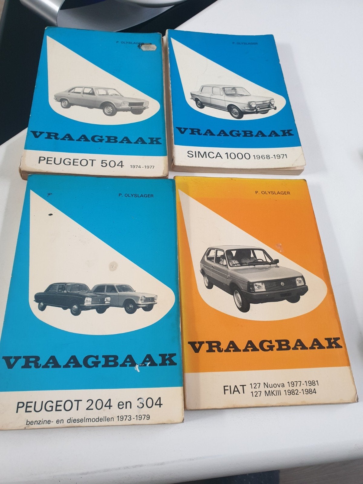 Set van 4 P. Olyslager Vraagbaak boeken, Verzenden