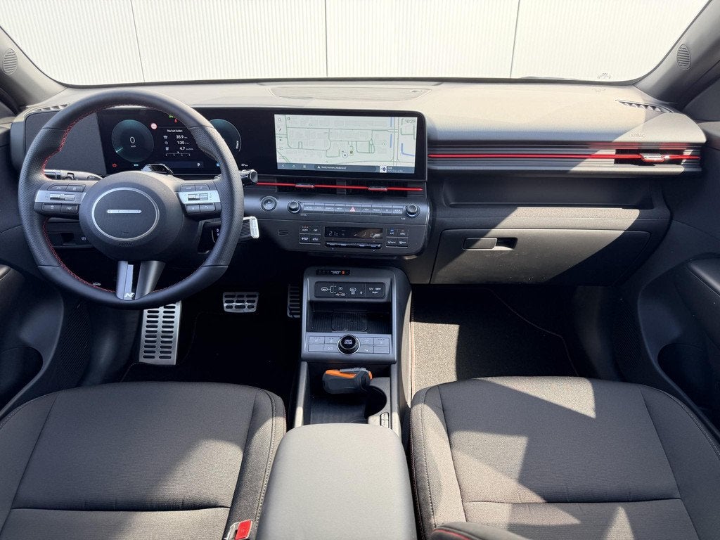 Hyundai Kona Electric N Line Business 64.8 kWh / Warmtepomp, Auto's, Hyundai, Stof, 750 kg, Wit, Origineel Nederlands
