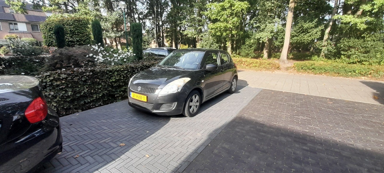 Suzuki Swift 1.2 5-D 2011 Zwart, Auto's, Voorwielaandrijving, 4 cilinders, 400 kg, Origineel Nederlands