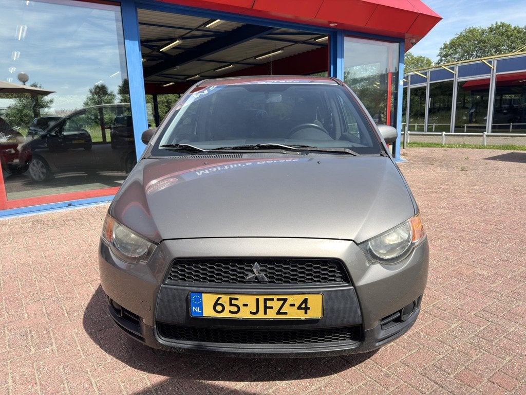 Mitsubishi Colt 1.3 Invite AIRCO CRUISE AUTOMAAT TREKHAAK!, Auto's, Mitsubishi, Stof, Gebruikt, 31 €/maand, Colt