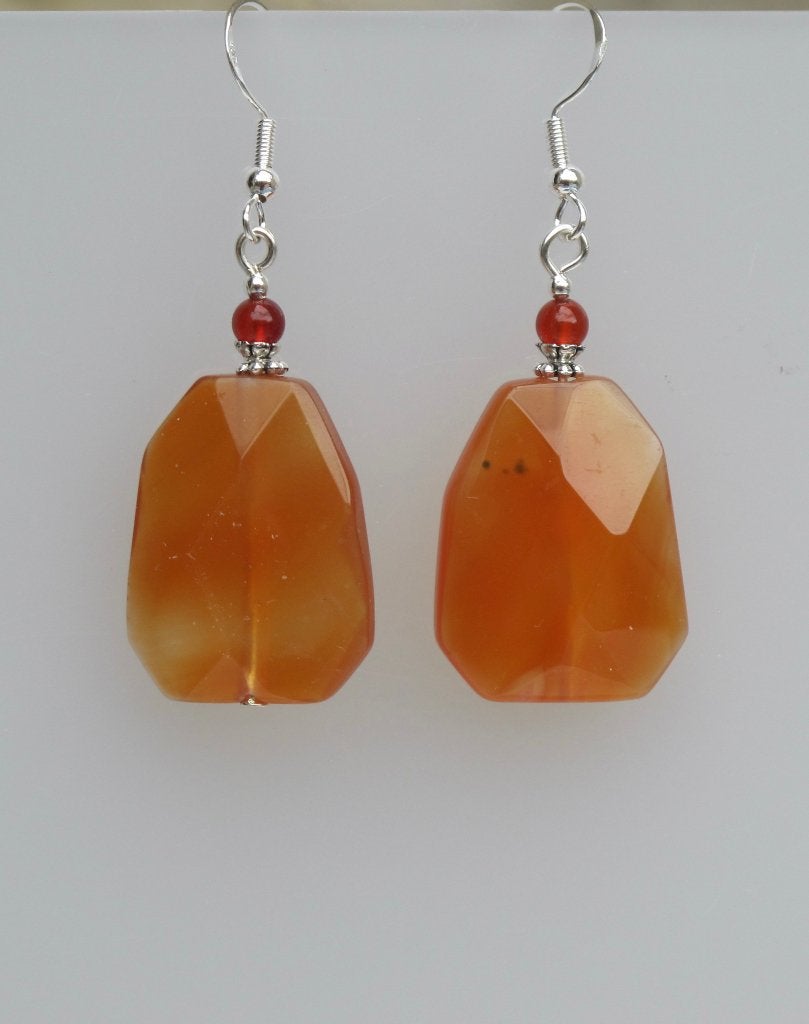 Prachtige oorbellen met gefacetteerde Carneool edelstenen, Hangers, Verzenden, Nieuw, Oranje