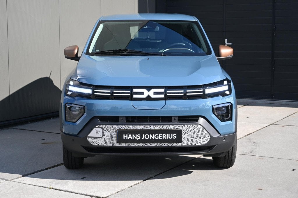Dacia Spring Extreme 65 26.8 kWh | DC-LADER | CAMERA | NAVI, Gebruikt, Leder en Stof, Origineel Nederlands, Parkeersensor