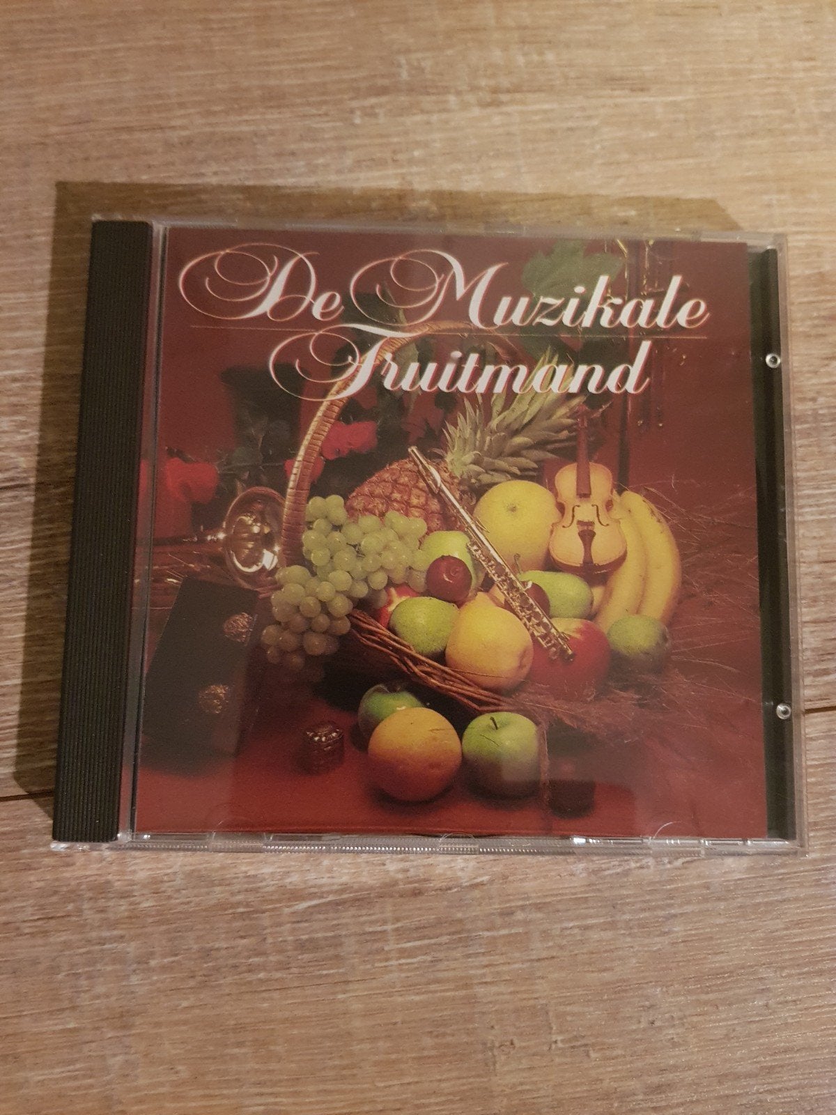 CD De Muzikale Fruitmand - Diverse n, Cd's en Dvd's, Ophalen of Verzenden, Zo goed als nieuw, Verzamelalbum, Inclusief boekje
