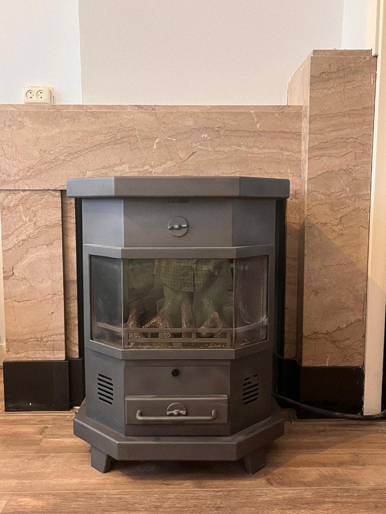 Gaskachel met verwisselbare sierpanelen – goede staat, Ophalen, 30 tot 80 cm, Gebruikt, Kachel