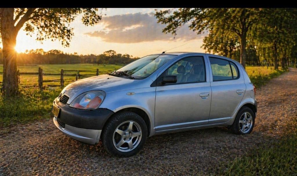 Toyota Yaris 1.0 16V Vvti 5DR 2002 Grijs apk 23-04-2027, 31 €/maand, 68 pk, Origineel Nederlands, Particulier