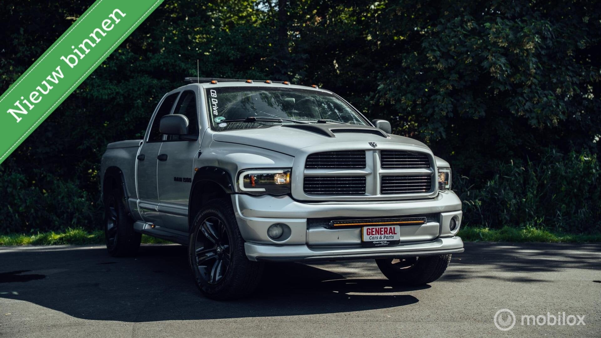Dodge Ram 1500 Laramie Quad Cab 4x4, Auto's, Dodge, Automaat, Gebruikt, 5654 cc, Bedrijf