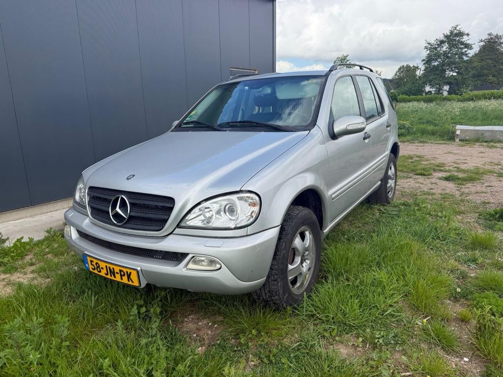 Mercedes-Benz M-Klasse 3.2 Ml320 4MATIC AUT 2002 Grijs, Auto's, Automaat, 138 €/maand, 7 stoelen, Vierwielaandrijving