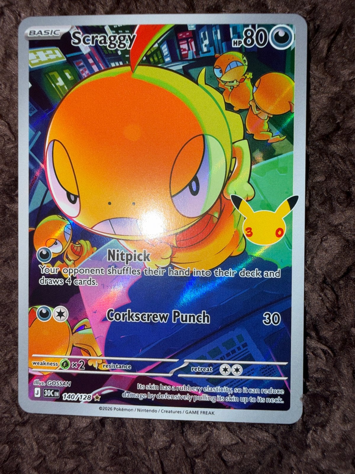 Pokémon Kaart Scraggy 140/128 Celebrations Foil, Ophalen of Verzenden, Zo goed als nieuw, Losse kaart, Foil