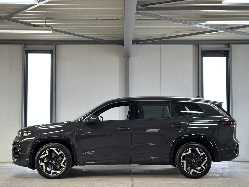 Volkswagen Tayron 1.5 eHybrid R-Line | Trekhaak-pakket | Nav, Auto's, Volkswagen, 12 maanden, Zwart, 4 cilinders, Leder en Stof