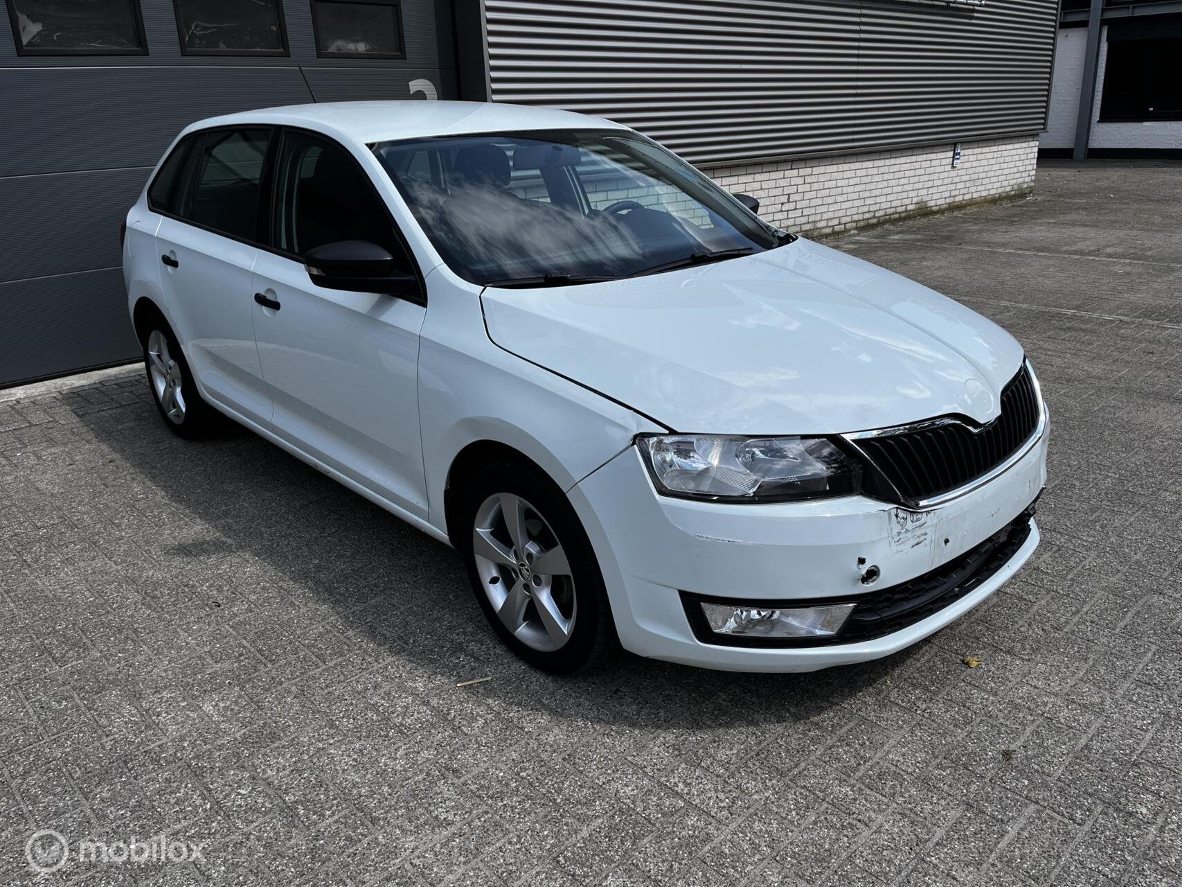 Skoda Rapid 1.2 TSI Greentech Edition, Auto's, Stof, Gebruikt, Zwart, 4 cilinders