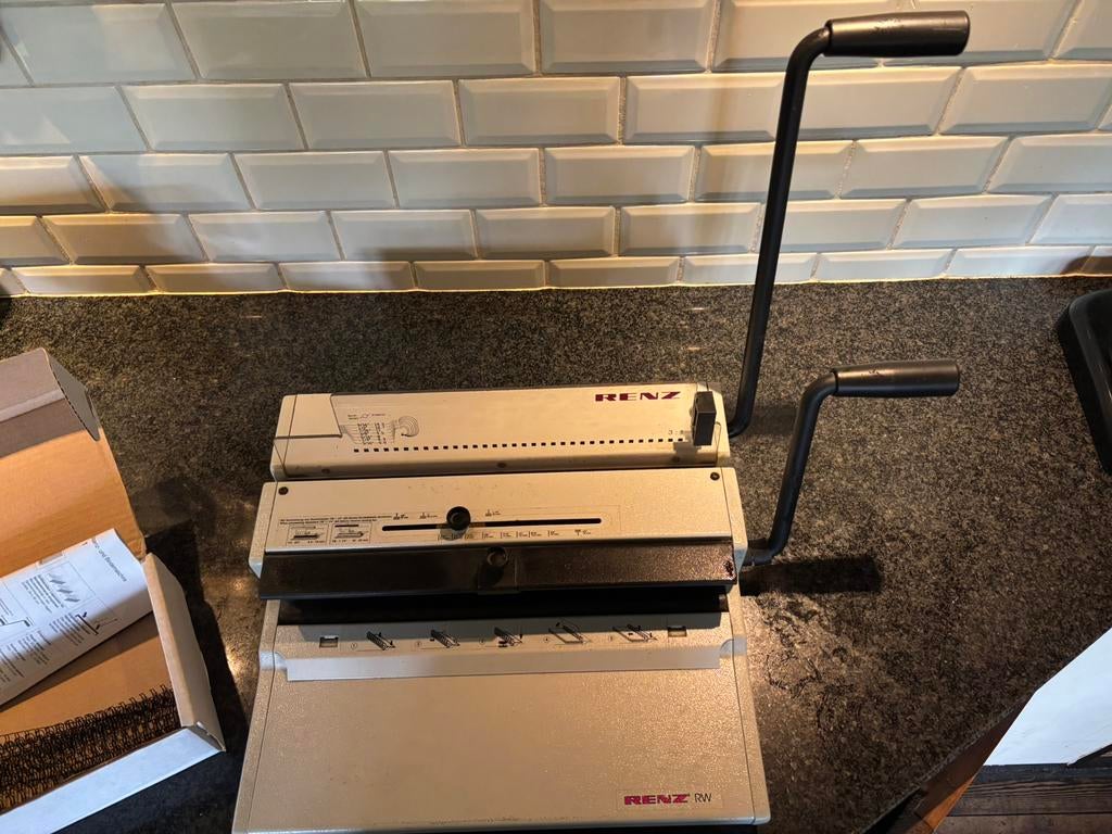 Renz A4 Ringband machine, Ophalen