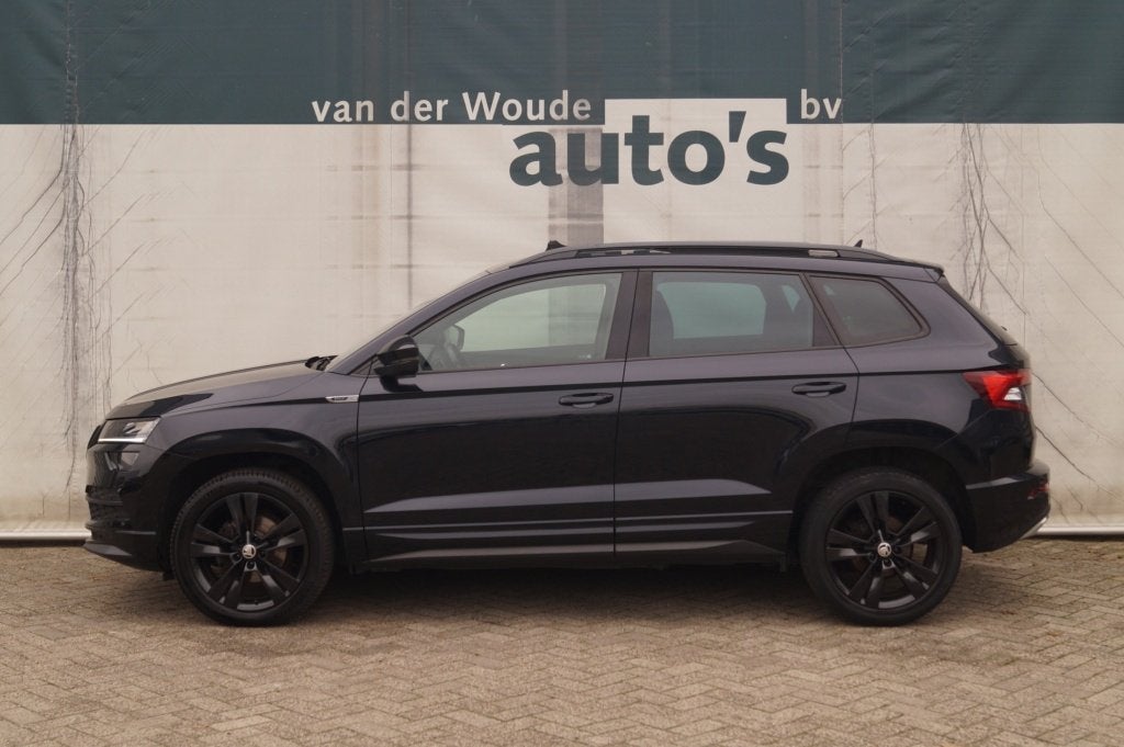 Skoda Karoq 1.5 TSI 150pk Sportline Business -PANO-ECC-LED-N, Auto's, Skoda, Voorwielaandrijving, Stof, Euro 6, 4 cilinders