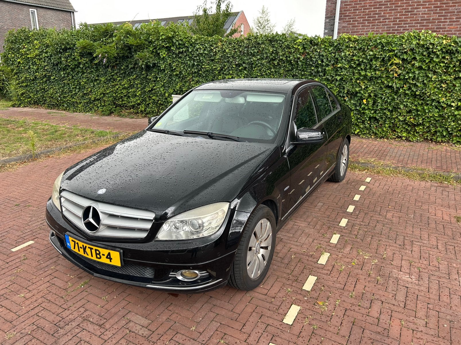 Youngtimer Mercedes-Benz C250 CGI met schuifdak, Auto's, Dealer onderhouden, Zwart, Leder en Stof, Zwart