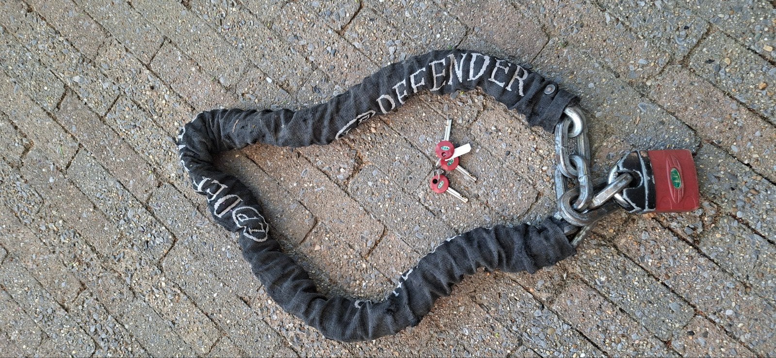 Defender kettingslot met hangslot en sleutels, Ophalen of Verzenden, Gebruikt
