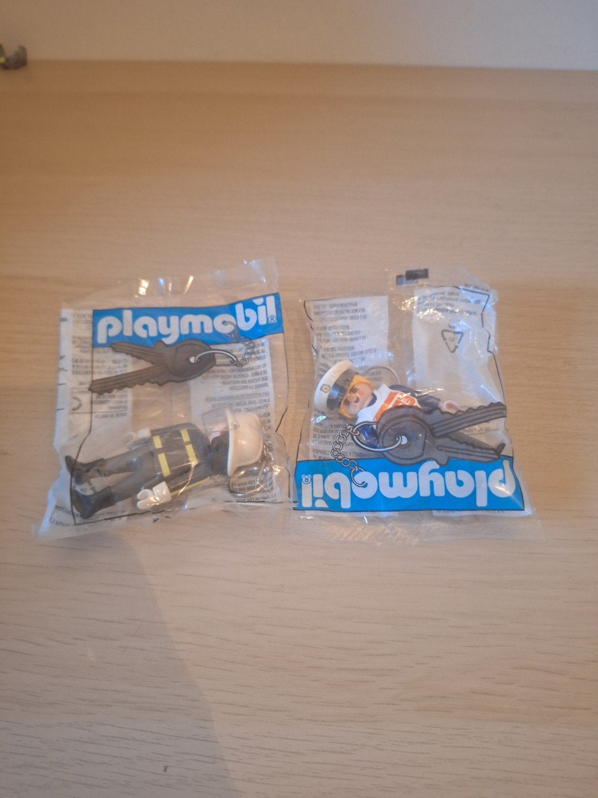 Playmobil sleutelhangers - Brandweerman en Politieagent, Verzamelen, Sleutelhangers, Ophalen of Verzenden, Nieuw, Merk