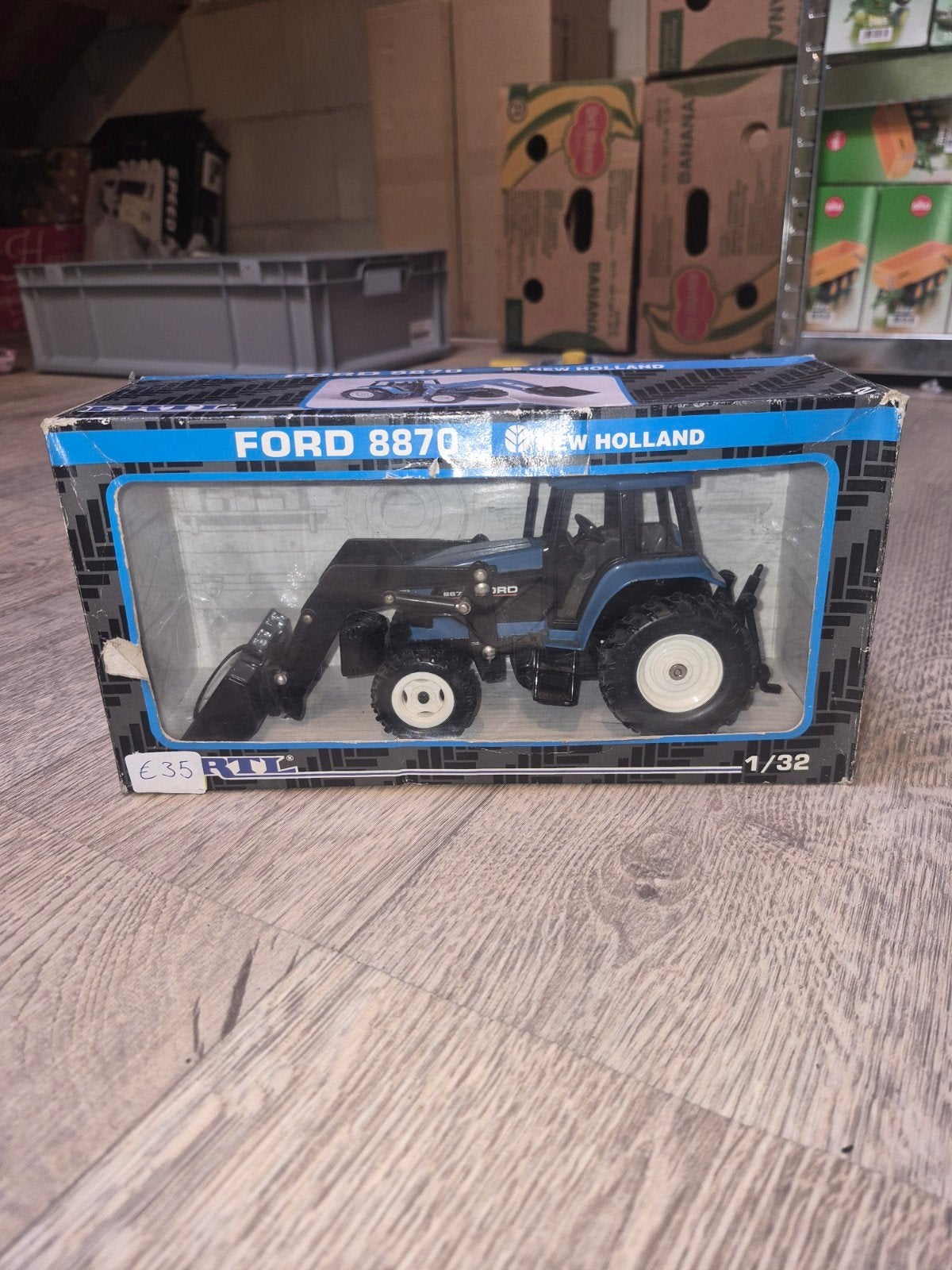 Ford 8870 New Holland Tractor schaalmodel 1/32, Hobby en Vrije tijd, ERTL, Ford New Holland, Tractor of Landbouw, Onbekend