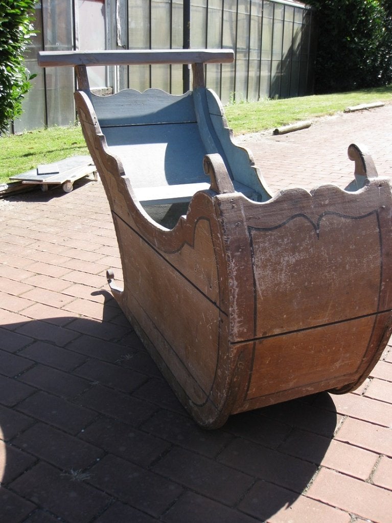 antieke duw slee, Ophalen