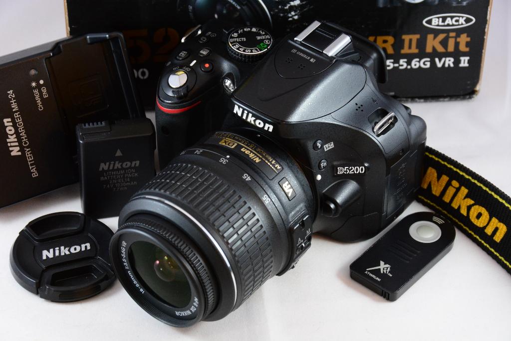 Nikon D5200 + AF-S 18-55mm VR kitlens 21169 CLICKS TOP STAAT, Gebruikt, Ophalen of Verzenden, Nikon, Cameraforsale@live.nl
