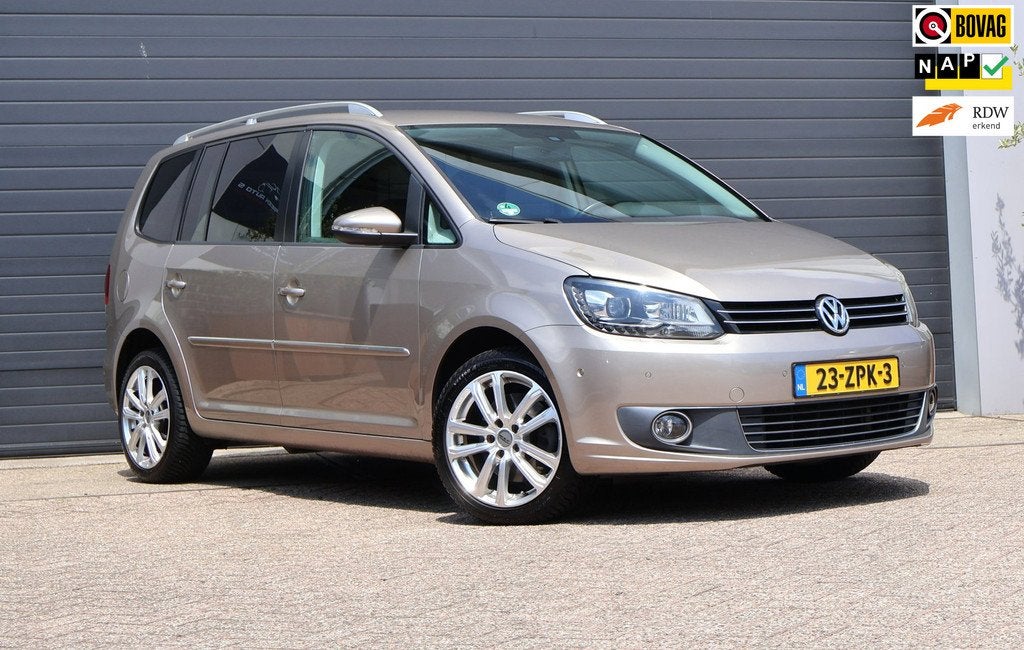 Volkswagen Touran 1.4 TSI Highline Leder/PDC/Luxe/Navi/Cruis, Auto's, Volkswagen, Euro 5, 15 km/l, Gebruikt, Zwart