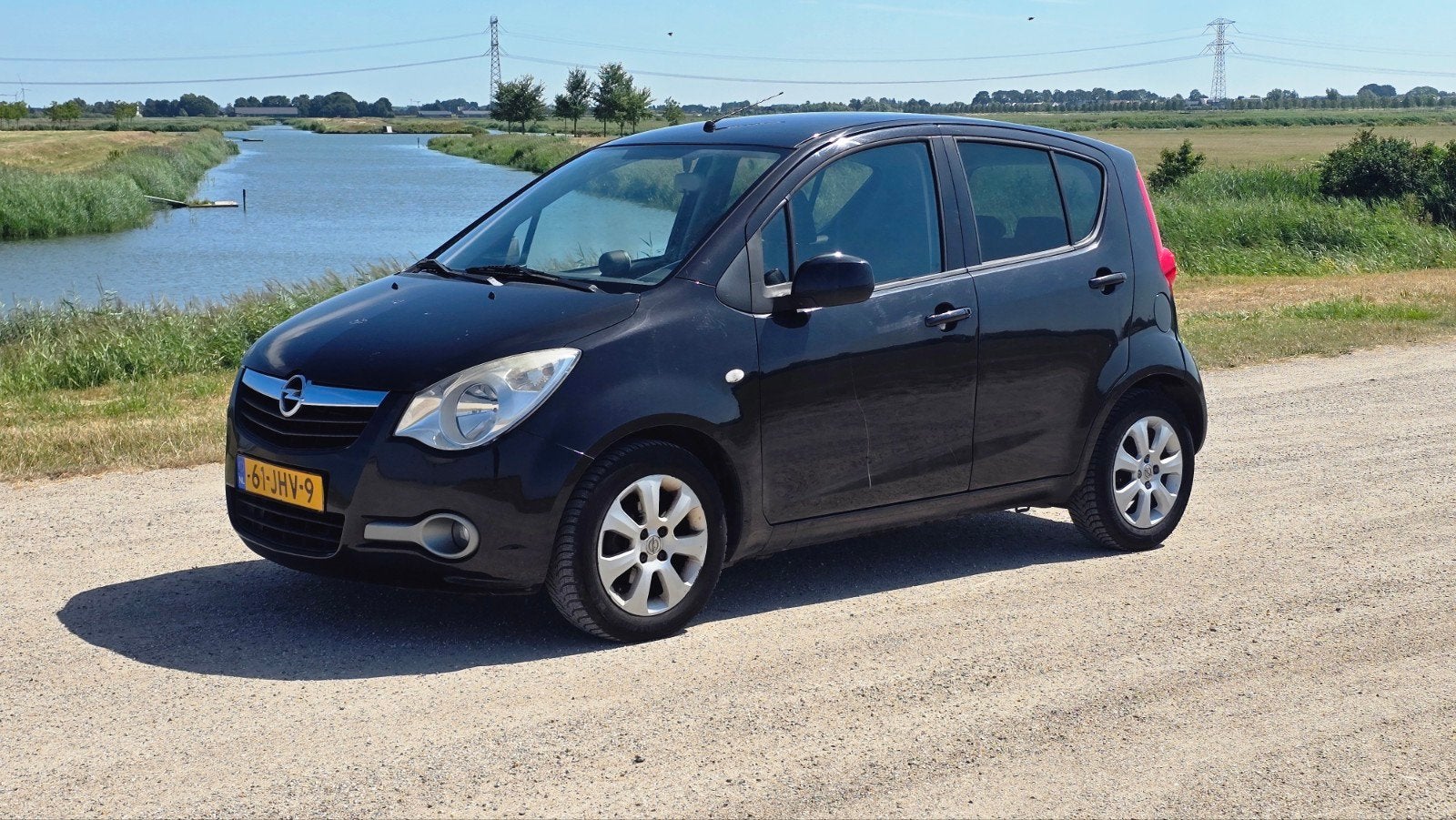 Opel Agila 1.2 16V 2010 Zwart / NWE APK / AIRCO / NAP /, Voorwielaandrijving, 40 €/maand, 4 cilinders, 965 kg