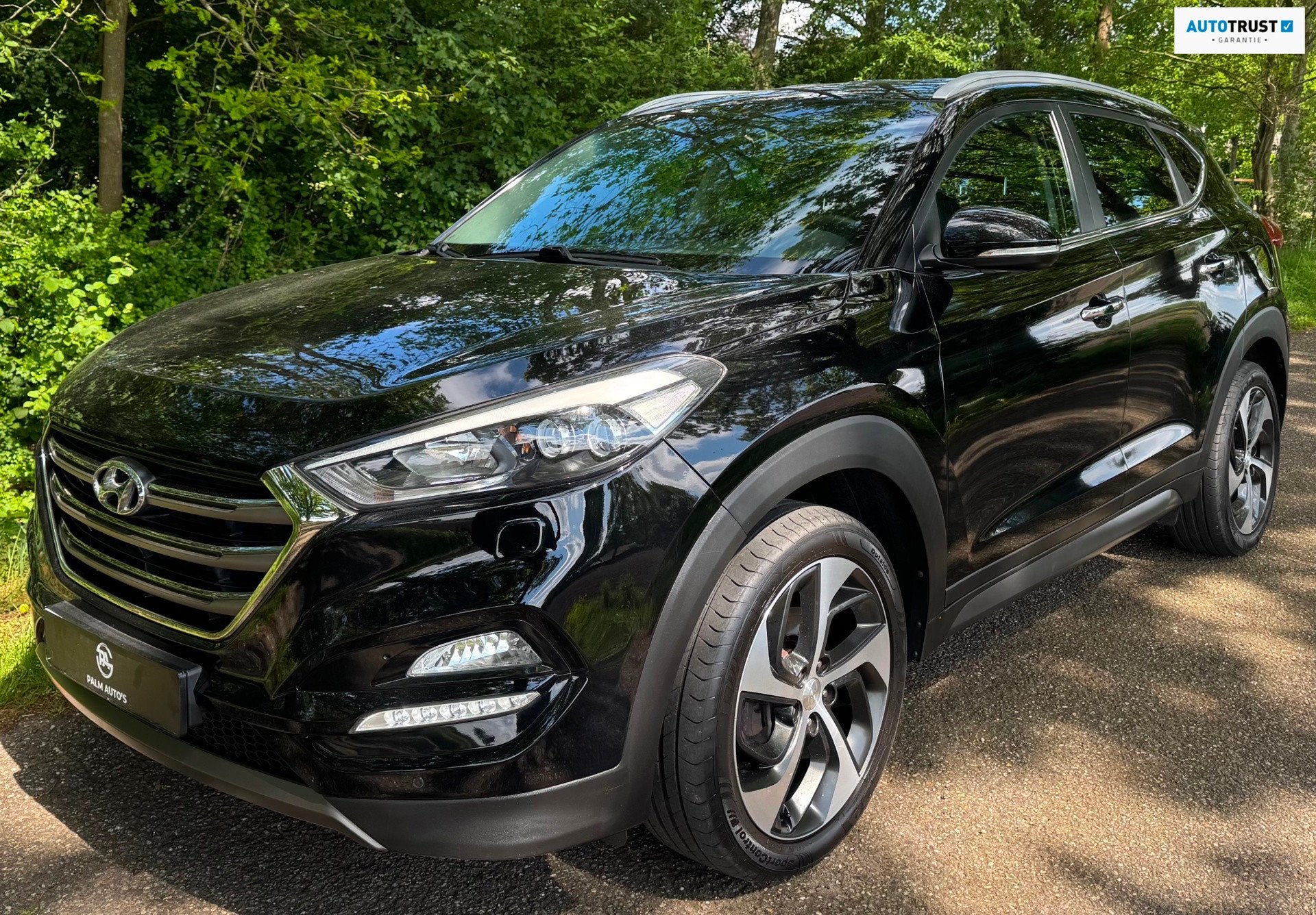 Hyundai Tucson 1.6 T-GDi Comfort 4WD 2016 CAMERA NAVI TREKHA, Auto's, 13 km/l, Dealer onderhouden, Stof, Gebruikt