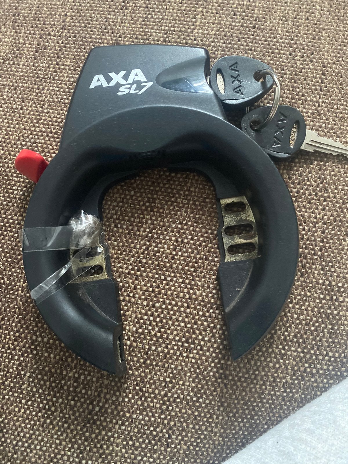 Axa sl7 ringslot fietsslot 2 sleutels 14 euro, Ophalen of Verzenden, Zo goed als nieuw, Ringslot