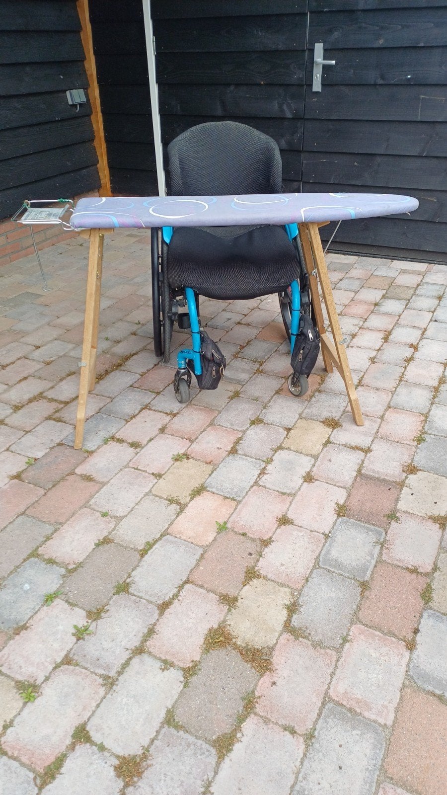 strijkplank voor rolstoel, Ophalen