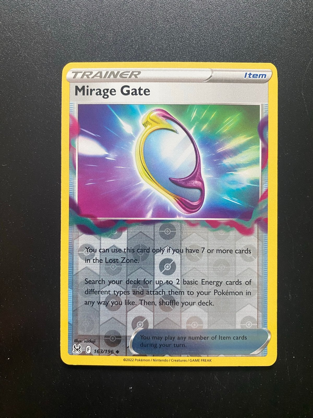 Mirage Gate 163/196 Reverse Holo Pokémon Lost Origin, Ophalen of Verzenden, Zo goed als nieuw, Losse kaart, Foil