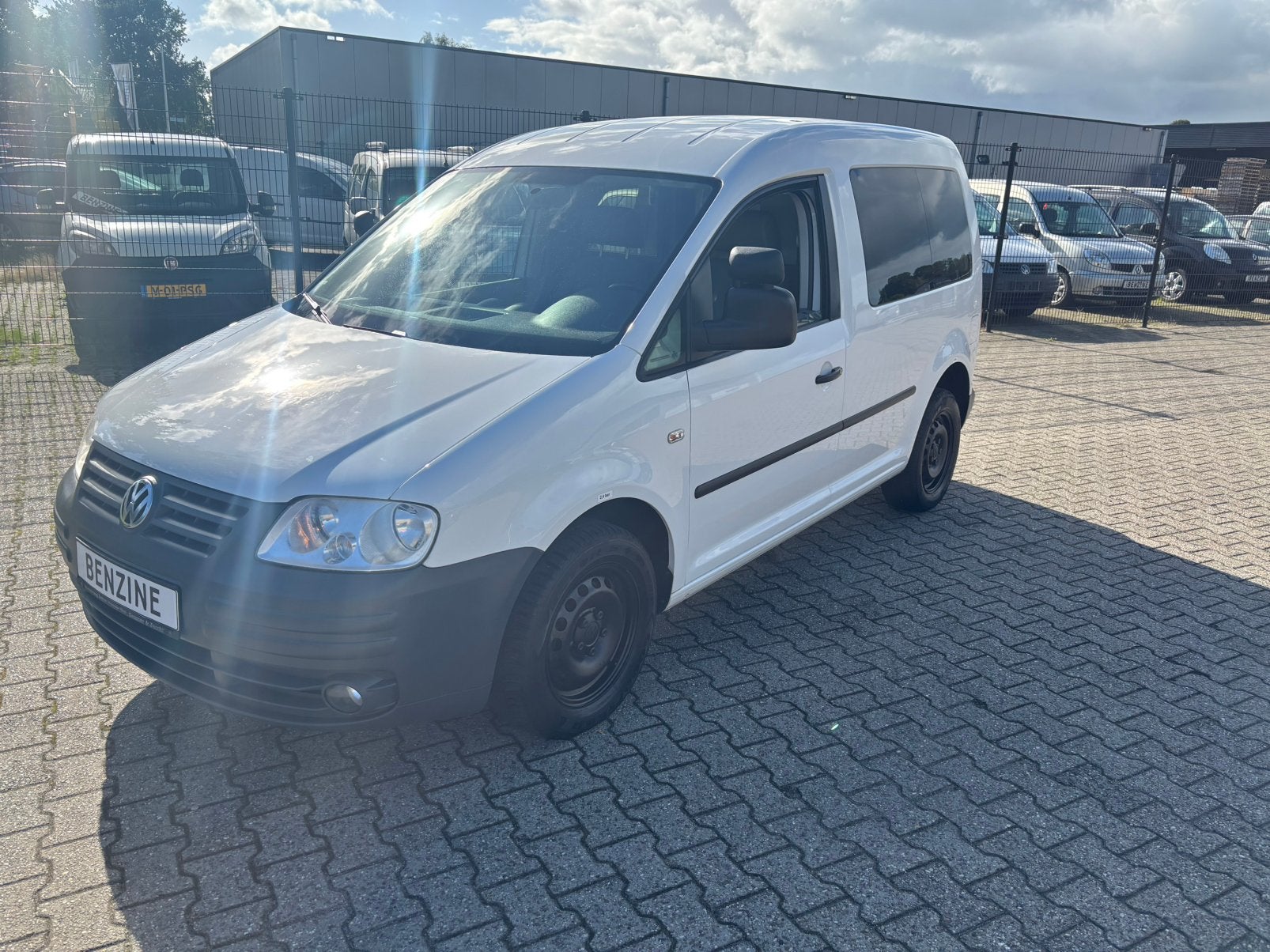 Vw caddy benzine grijs kenteken 41000 km, Stof, 4 cilinders, Volkswagen, Schuifdeur