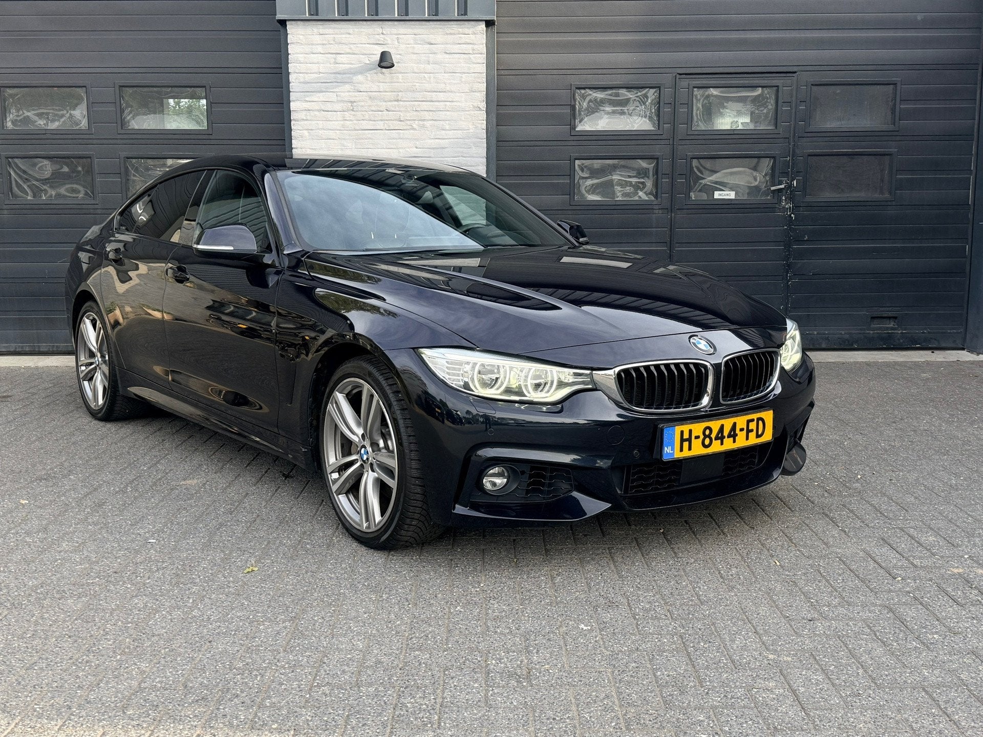 BMW 4-serie Gran Coupé 440i xDrive Centennial High Executiv, Auto's, 327 pk, Zwart, Bedrijf, Vierwielaandrijving