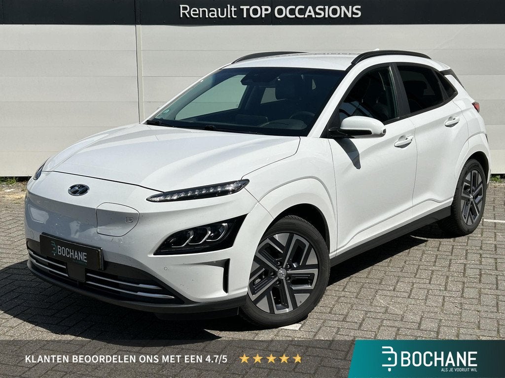 Hyundai Kona EV Premium 64 kWh | SoH 100% | Full Options | A, Auto's, Hyundai, Gebruikt, Huisgarantie, Met garantie (alle), Wit