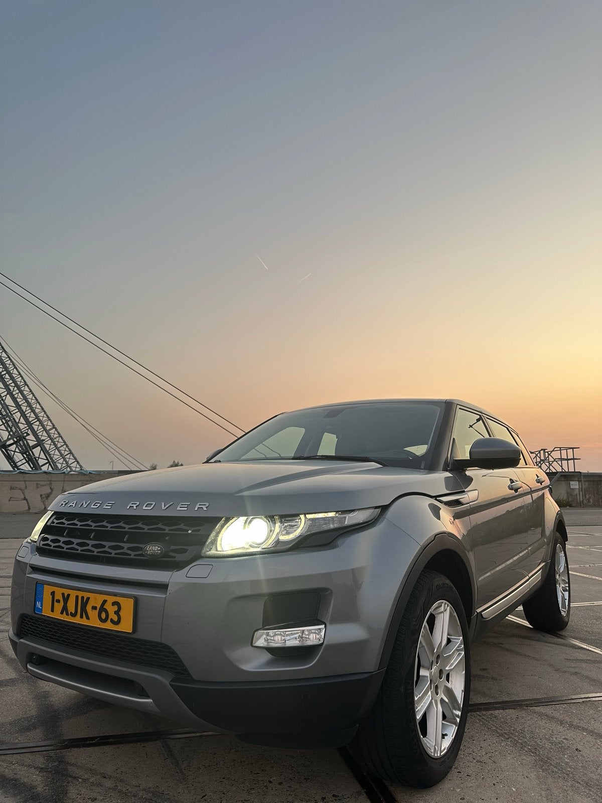 Land Rover Range Rover Evoque 2.0 SI4 4WD AUT 2014 Grijs, Auto's, Land Rover, 1800 kg, Zwart, 4 cilinders, Vierwielaandrijving
