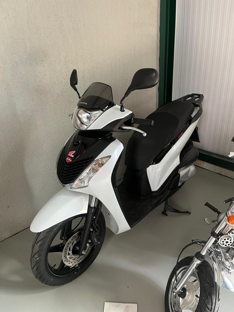 Te koop: Honda SH125, Ophalen, Zo goed als nieuw, Blok, Honda