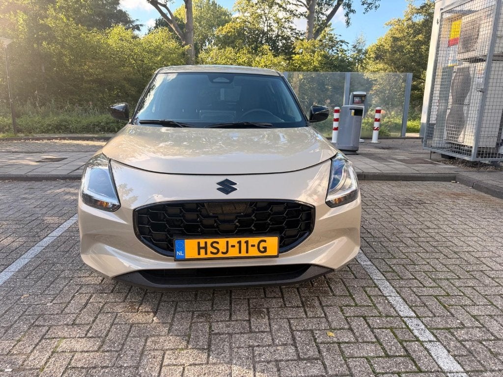 Suzuki Swift 1.2 Smart Hybrid 83pk CVT 2025 (Black Edition), Auto's, Dealer onderhouden, Stof, Zwart, Bruin