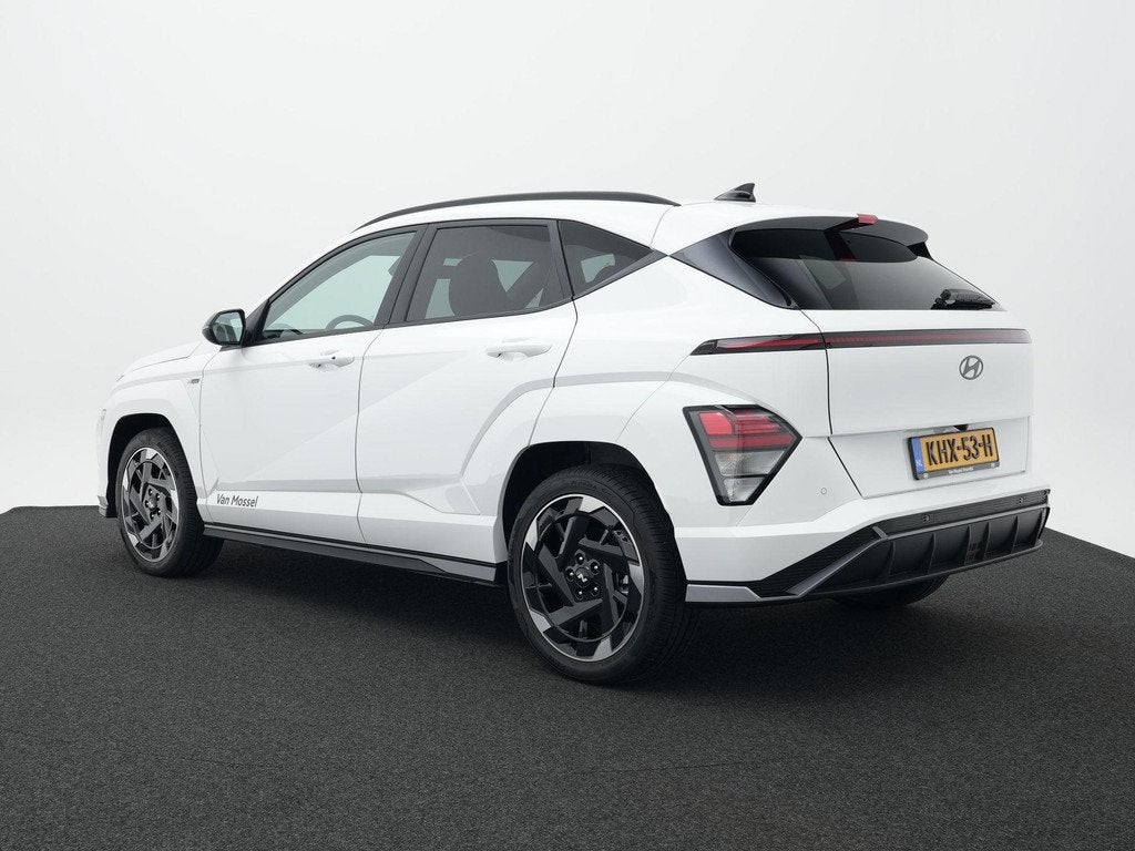 Hyundai Kona Electric N Line Business 64.8 kWh | Bose Audio, Auto's, Hyundai, 12 maanden, Stof, 750 kg, Wit