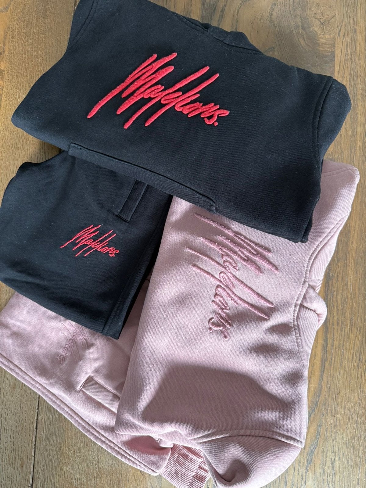 Malelions  Hoodies trainings pak - Zwart en Roze maat 116, Ophalen of Verzenden, Zo goed als nieuw