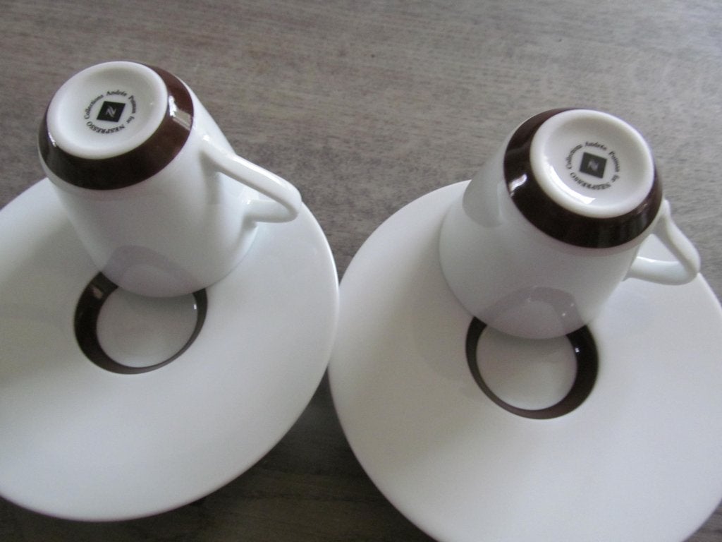 2 Nespresso Andree Putman Kop en Schotels Espresso, Keramiek, Ophalen of Verzenden, Zo goed als nieuw, Overige stijlen
