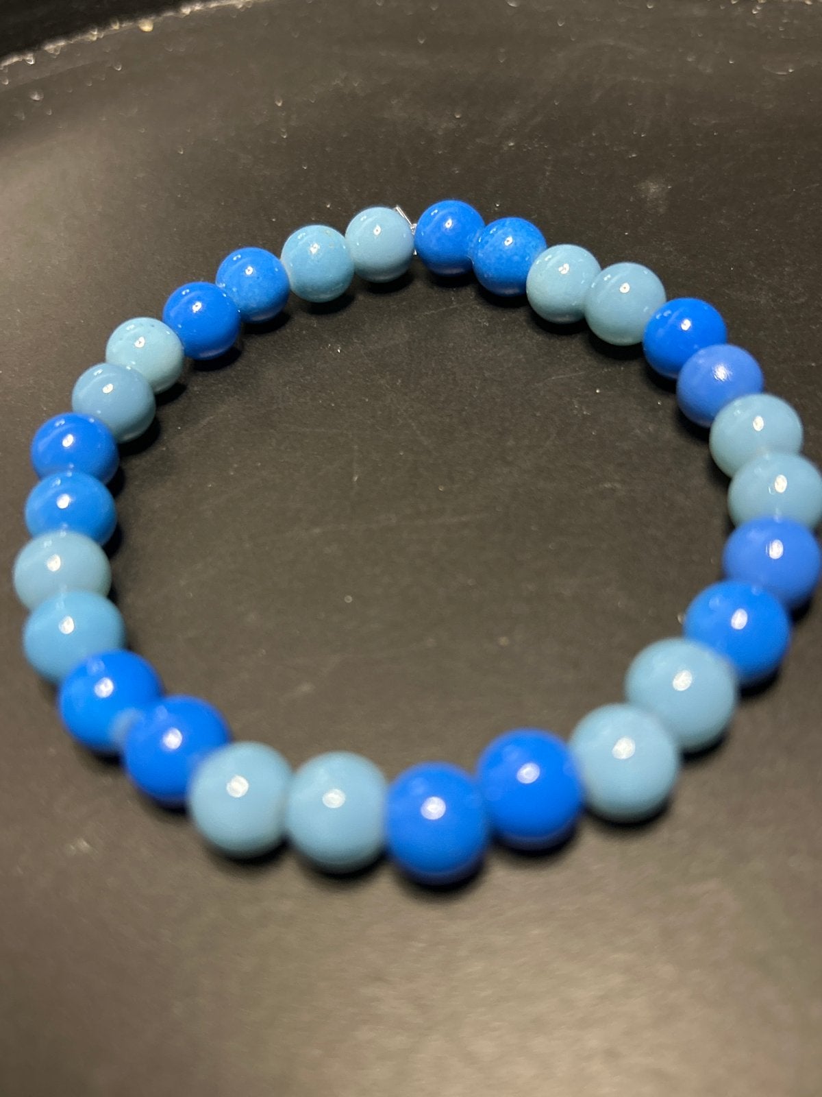 Blauwe kralenarmband - Nieuw, Sieraden, Tassen en Uiterlijk, Verzenden, Nieuw, Blauw, Kunststof of Plastic