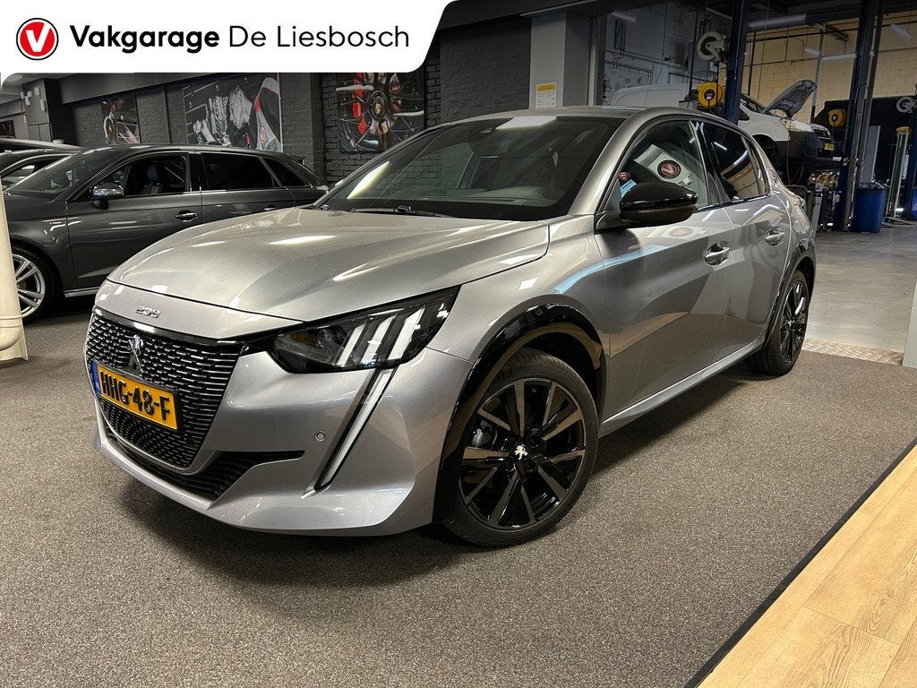 Peugeot 208 1.2 PureTech GT 100 PK | Airco | Navigatie | cam, 101 pk, Gebruikt, Leder en Stof, Handgeschakeld