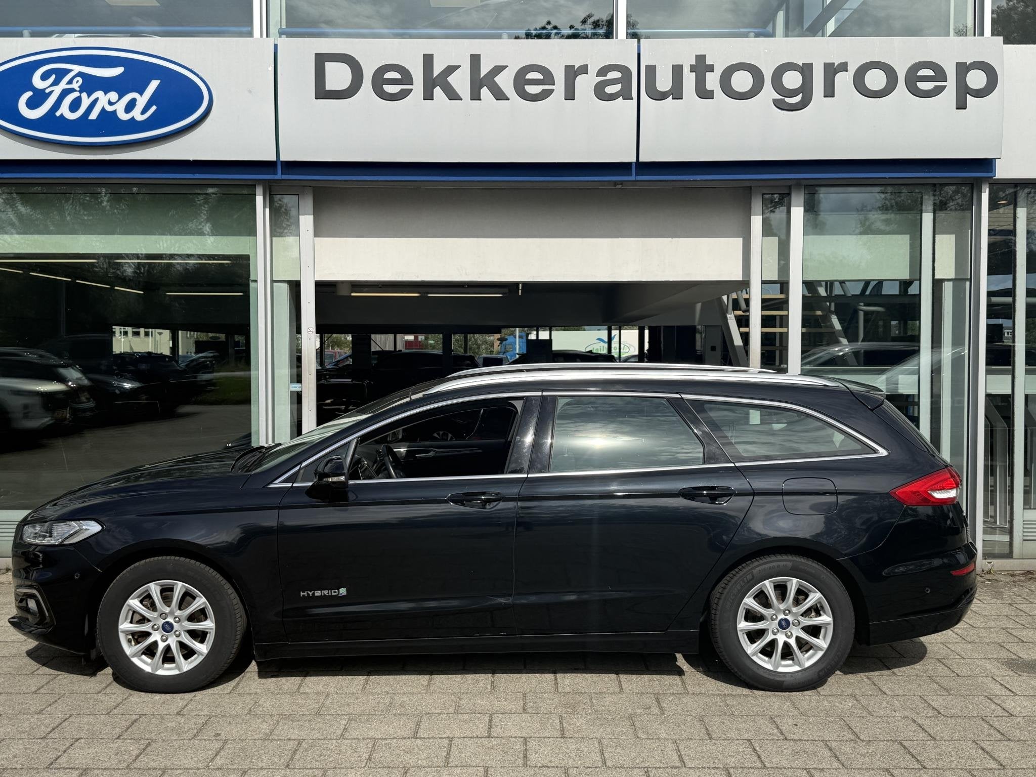 Ford Mondeo Wagon 2.0 IVCT HEV Titanium, Auto's, Ford, 188 pk, Stof, Gebruikt, 4 cilinders