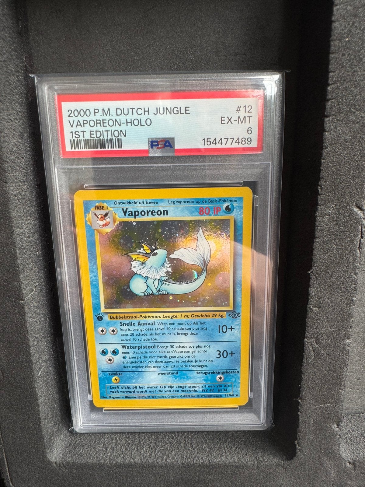 Vaporeon 1st edition Fossil NL PSA 6, Ophalen of Verzenden, Zo goed als nieuw
