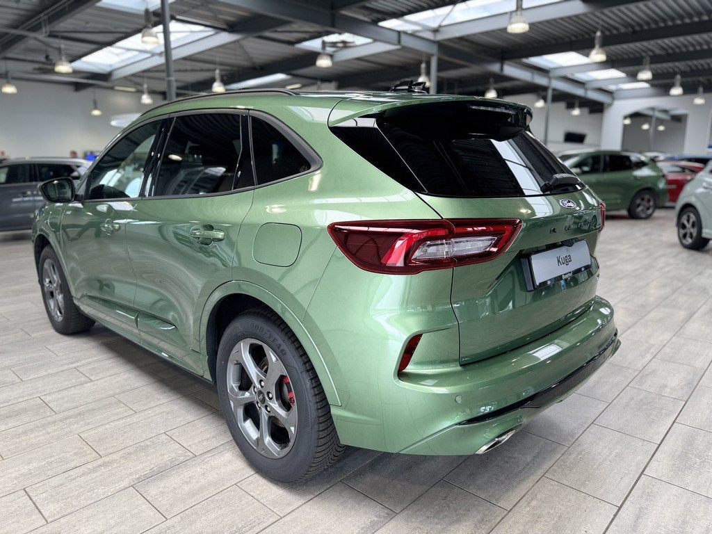 Ford Kuga 2.5 PHEV 243 pk ST-Line X | Trekhaak I AGR stoelen, Auto's, Ford, 12 maanden, Gebruikt, Zwart, Bedrijf